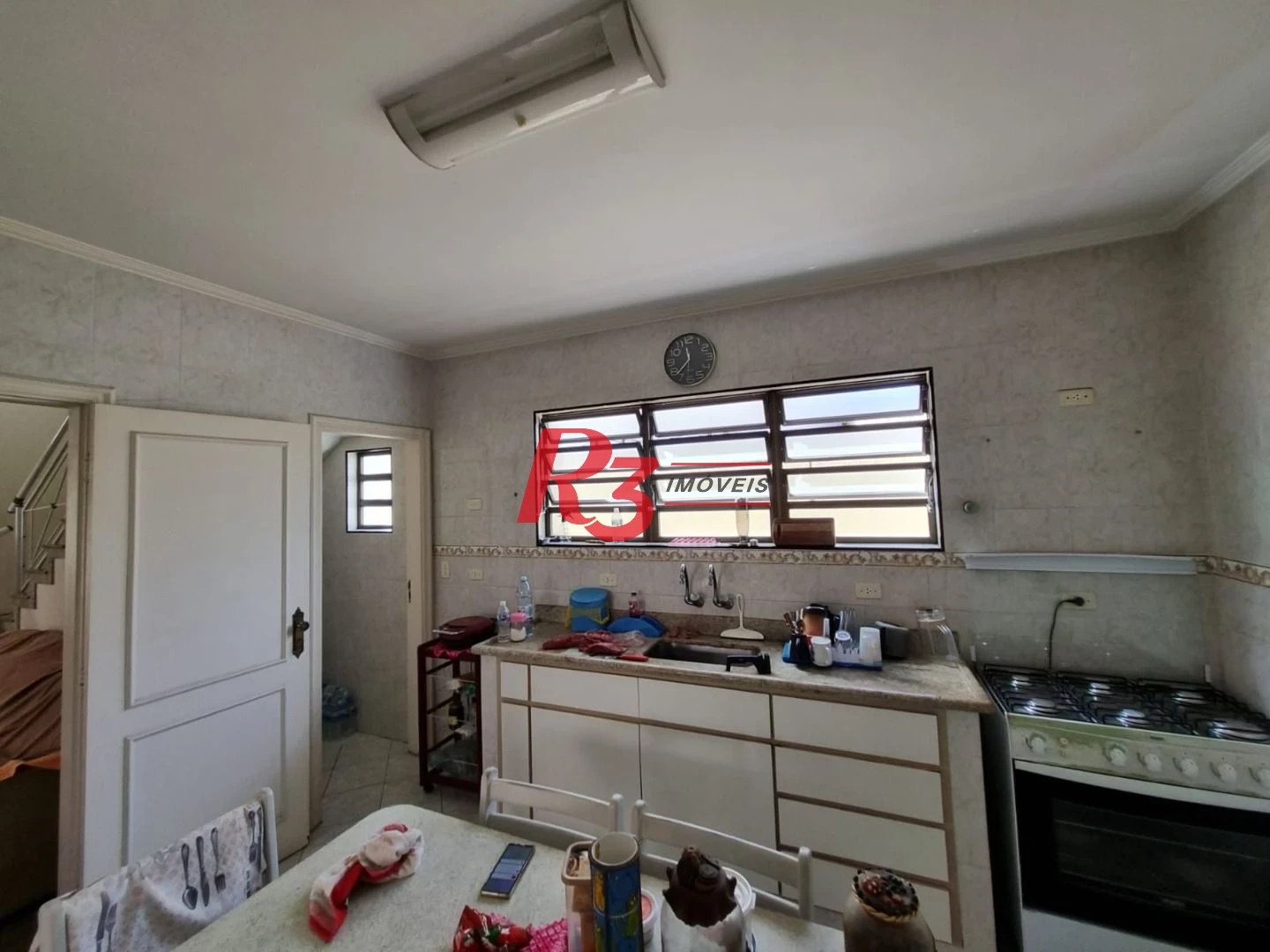 Oportunidade à venda na Vila Belmiro, terreno com 500 m², 2 amplas casas, com 3 dormitórios cada, espaço generoso de quintal e garagem para 6 carros!!