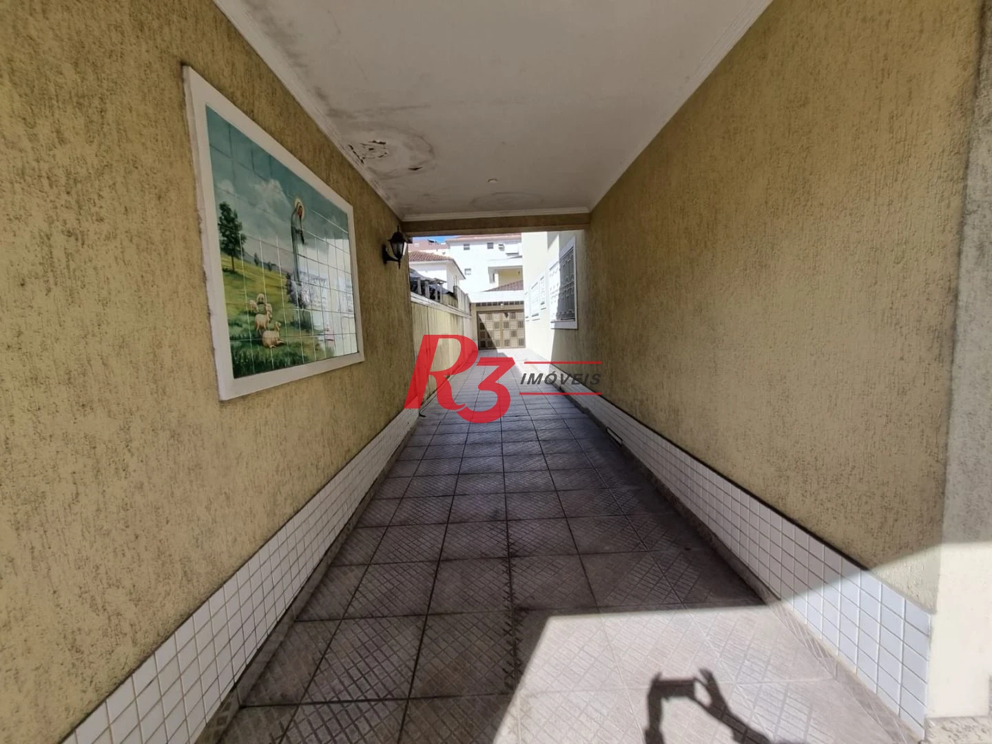 Oportunidade à venda na Vila Belmiro, terreno com 500 m², 2 amplas casas, com 3 dormitórios cada, espaço generoso de quintal e garagem para 6 carros!!