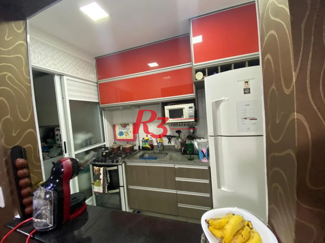 Apartamento à venda, 69 m² por R$ 440.000,00 - Areia Branca - Santos/SP