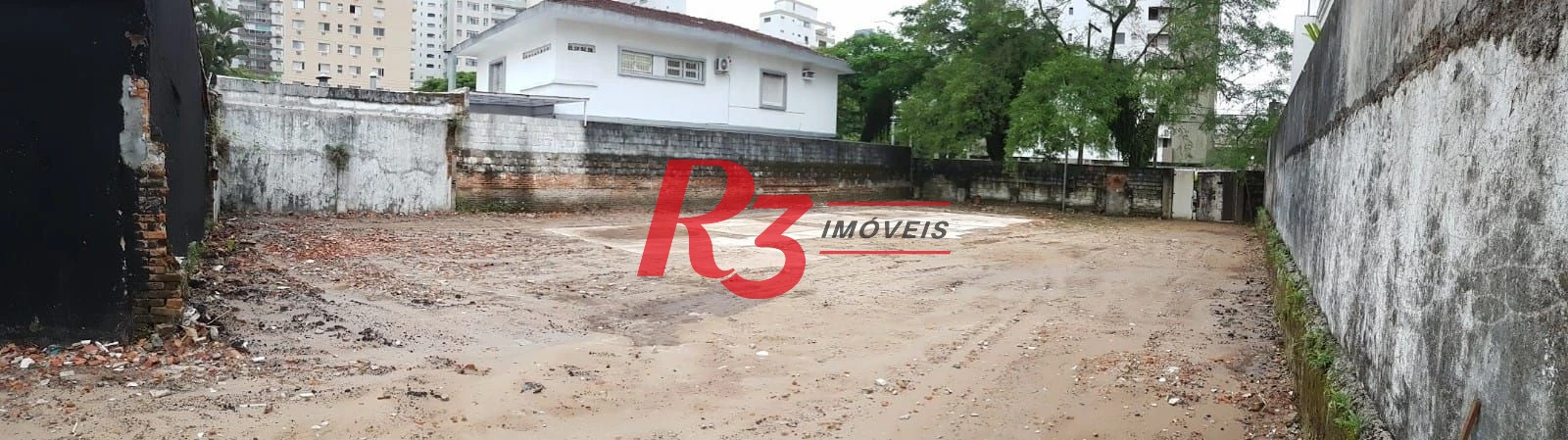Terreno para alugar, 654 m² por R$ 10.913,07/mês - Centro - Guarujá/SP