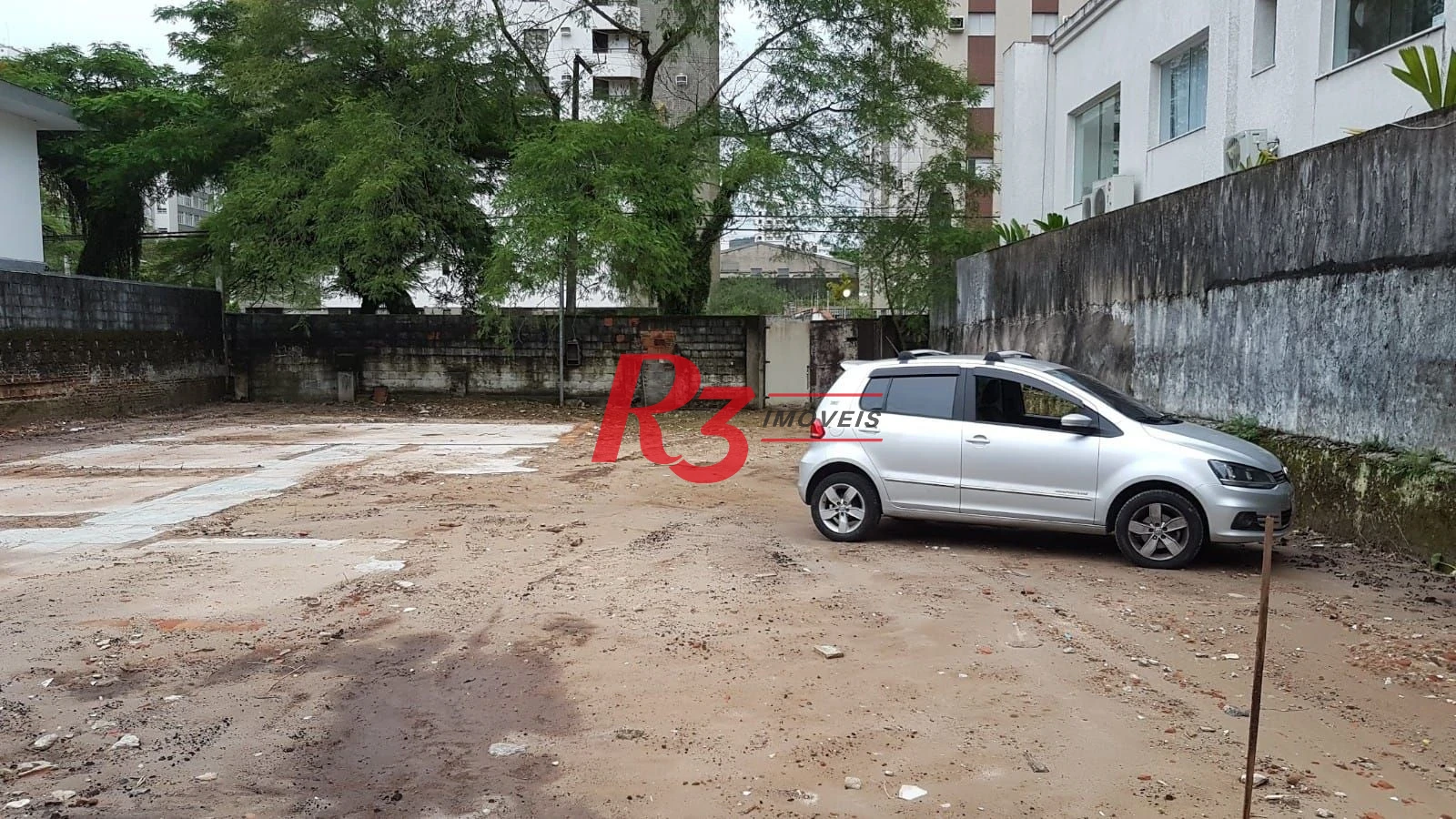 Terreno para alugar, 654 m² por R$ 10.913,07/mês - Centro - Guarujá/SP