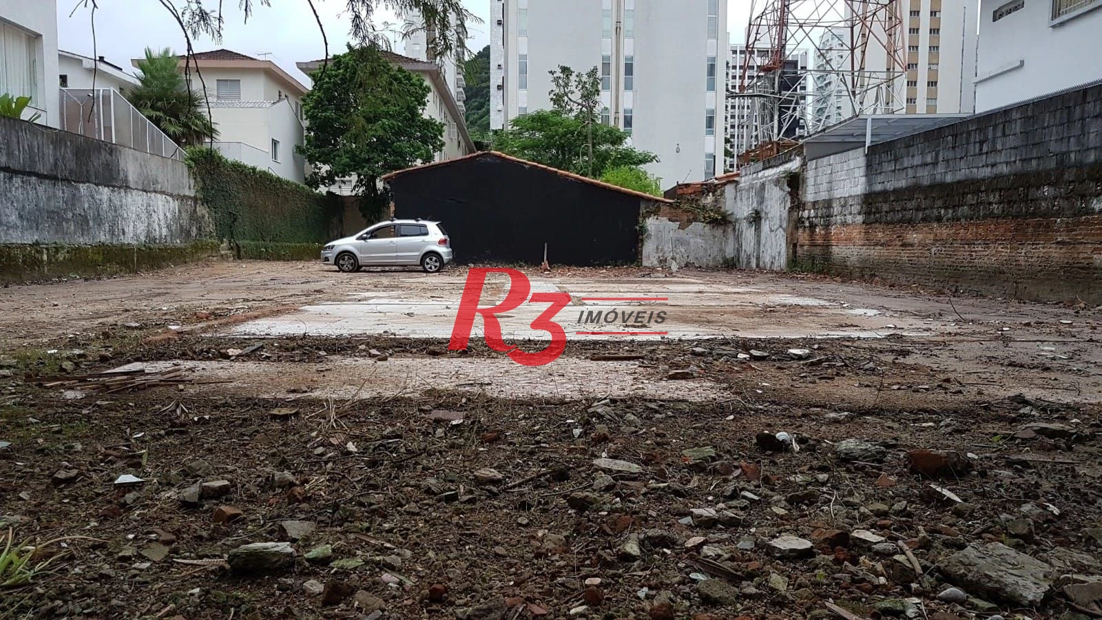 Terreno para alugar, 654 m² por R$ 10.913,07/mês - Centro - Guarujá/SP