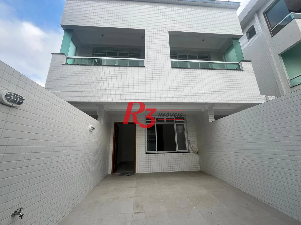 Casa com 3 dormitórios à venda, 150 m² por R$ 950.000,00 - Ponta da Praia - Santos/SP