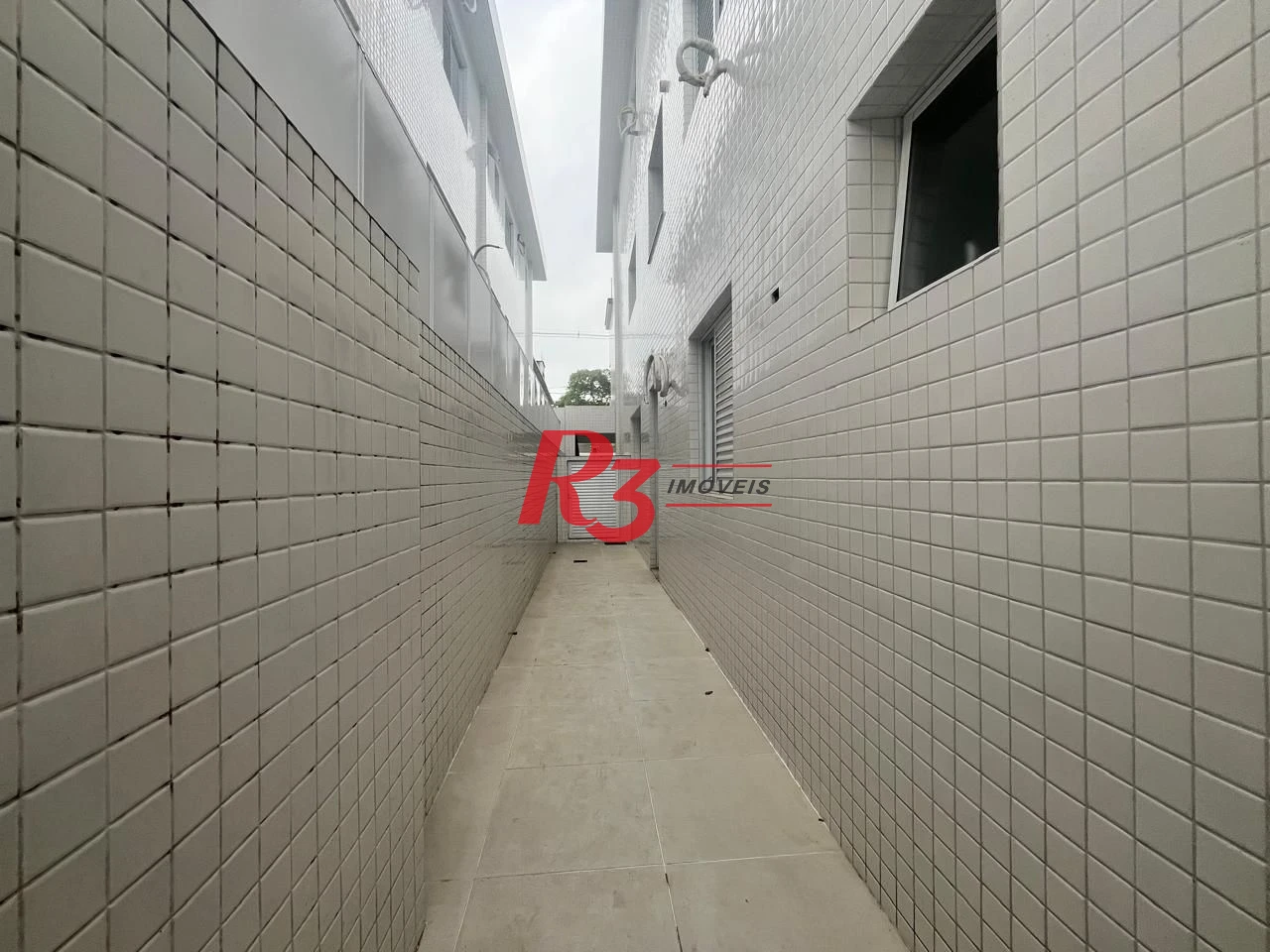 Casa com 3 dormitórios à venda, 150 m² por R$ 950.000,00 - Ponta da Praia - Santos/SP