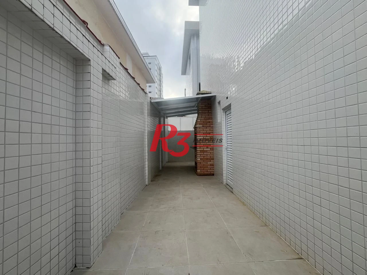 Casa com 3 dormitórios à venda, 150 m² por R$ 950.000,00 - Ponta da Praia - Santos/SP