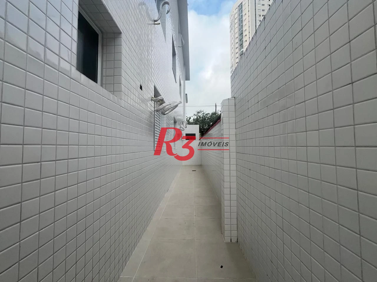 Casa com 3 dormitórios à venda, 150 m² por R$ 950.000,00 - Ponta da Praia - Santos/SP