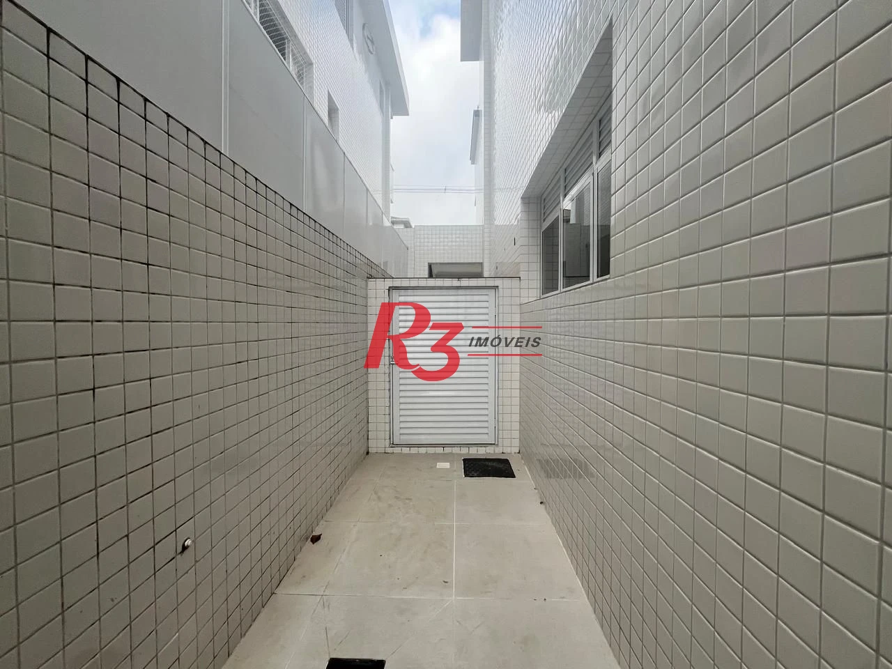 Casa com 3 dormitórios à venda, 150 m² por R$ 950.000,00 - Ponta da Praia - Santos/SP