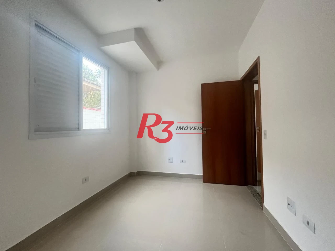 Casa com 3 dormitórios à venda, 150 m² por R$ 950.000,00 - Ponta da Praia - Santos/SP