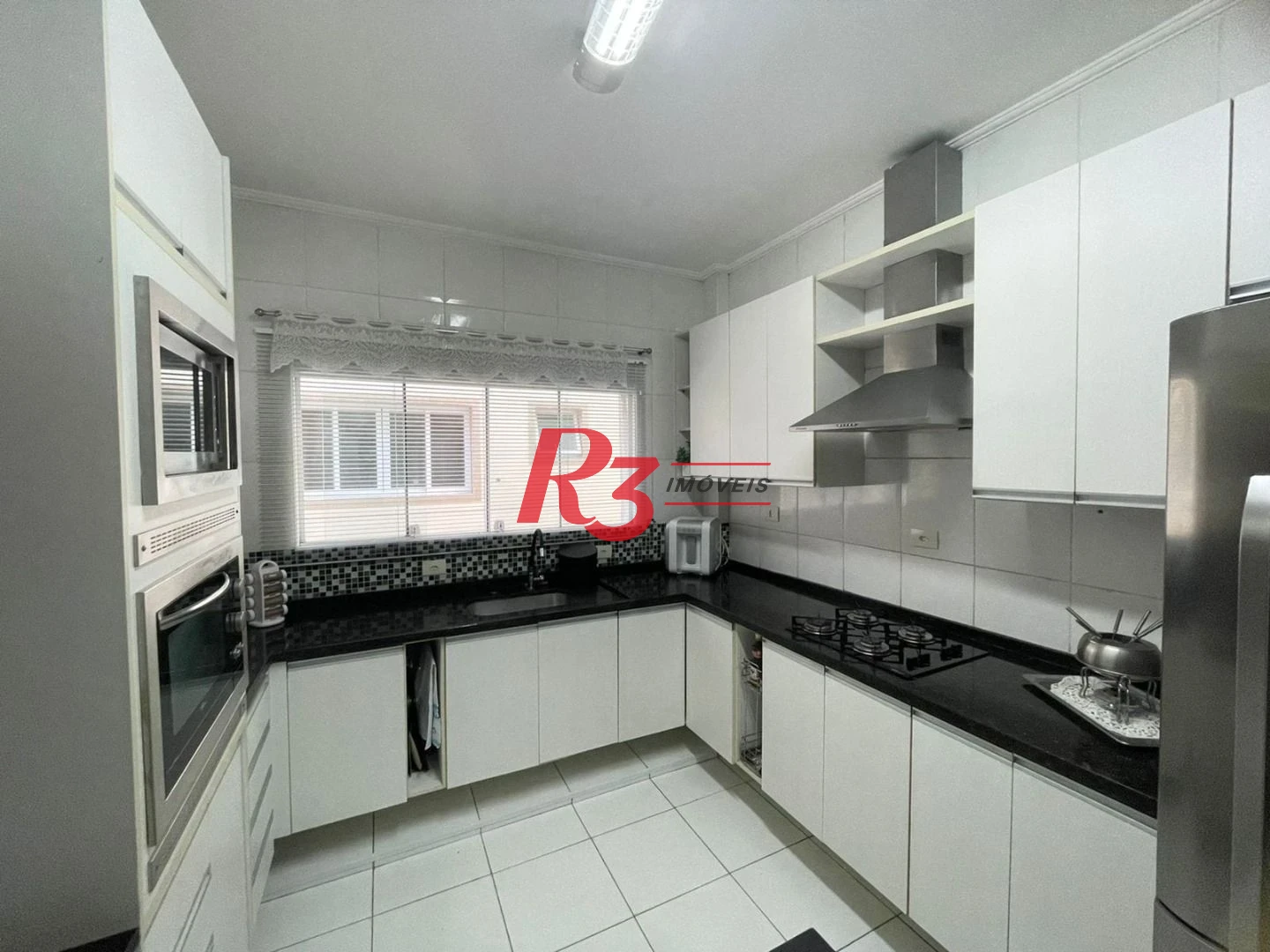 Casa à venda, 130 m² por R$ 1.400.000,00 - Embaré - Santos/SP