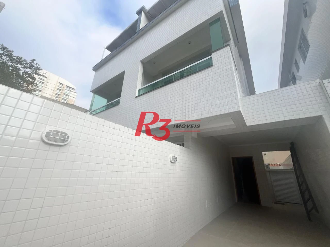 Casa com 3 dormitórios à venda, 150 m² por R$ 950.000,00 - Ponta da Praia - Santos/SP