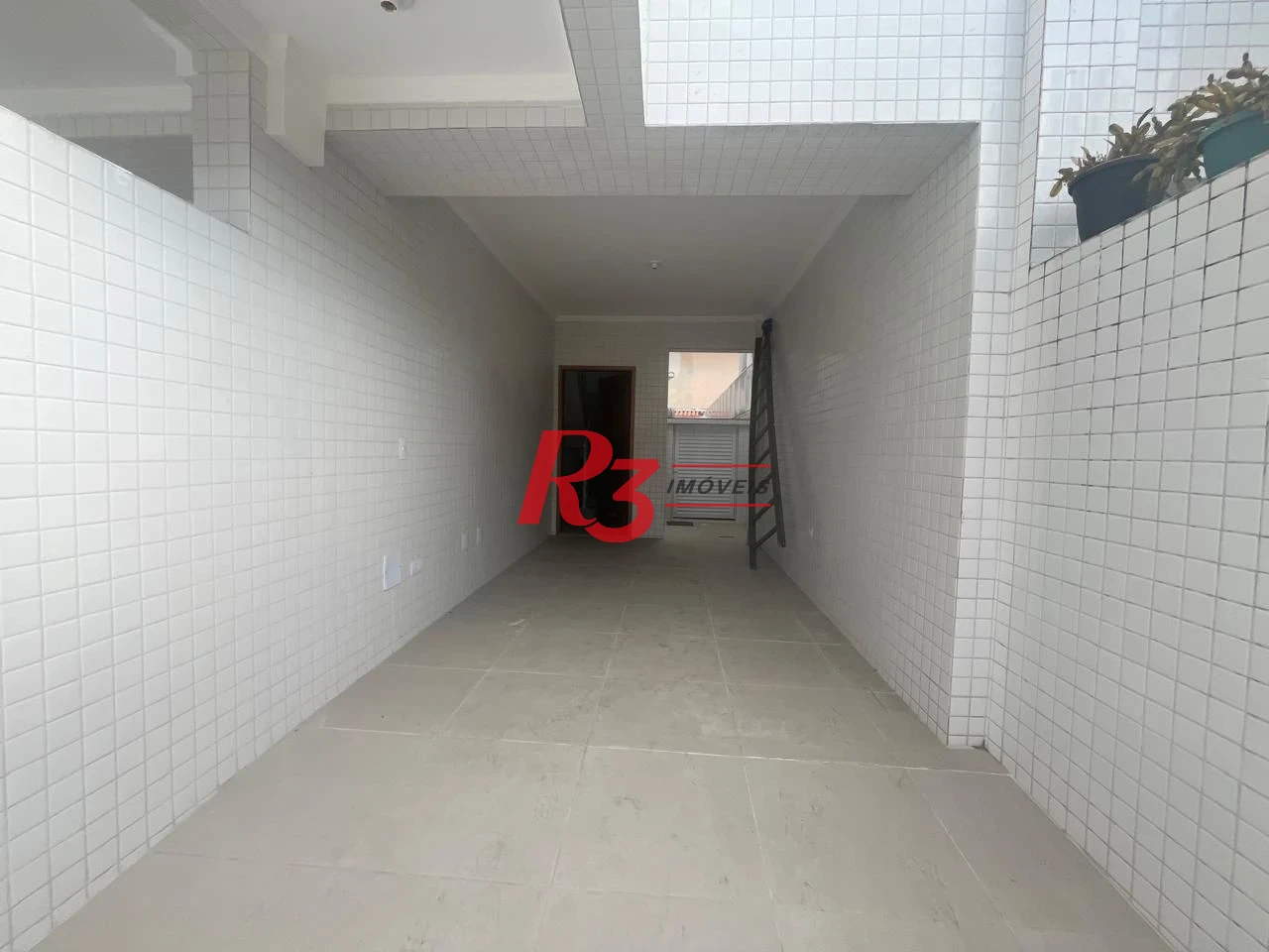 Casa com 3 dormitórios à venda, 150 m² por R$ 950.000,00 - Ponta da Praia - Santos/SP