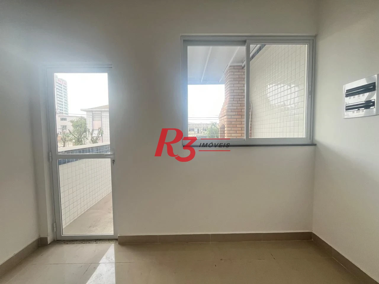 Casa com 3 dormitórios à venda, 150 m² por R$ 950.000,00 - Ponta da Praia - Santos/SP