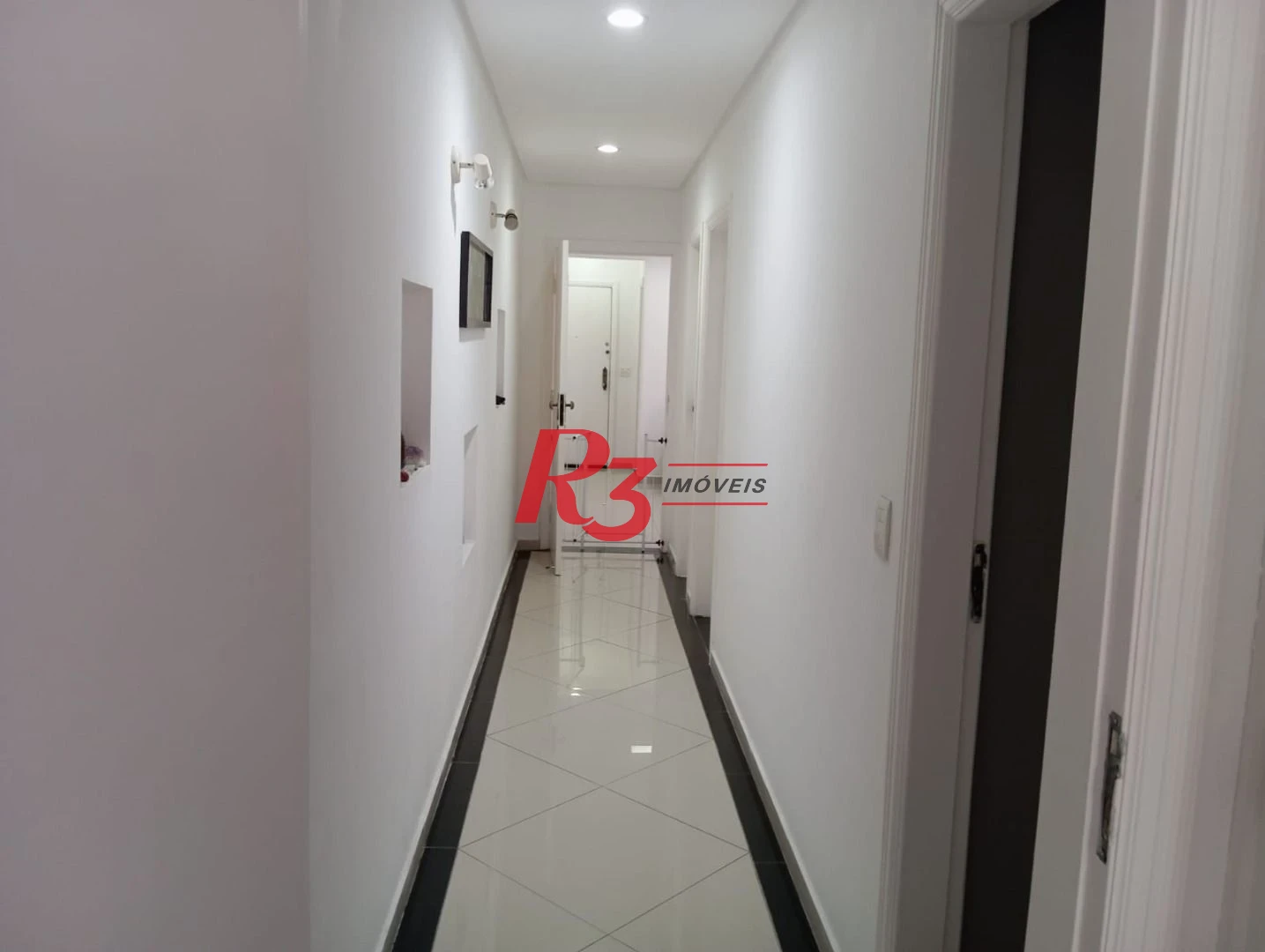 Apartamento com 3 dormitórios à venda, 102 m² por R$ 630.000,00 - Ponta da Praia - Santos/SP