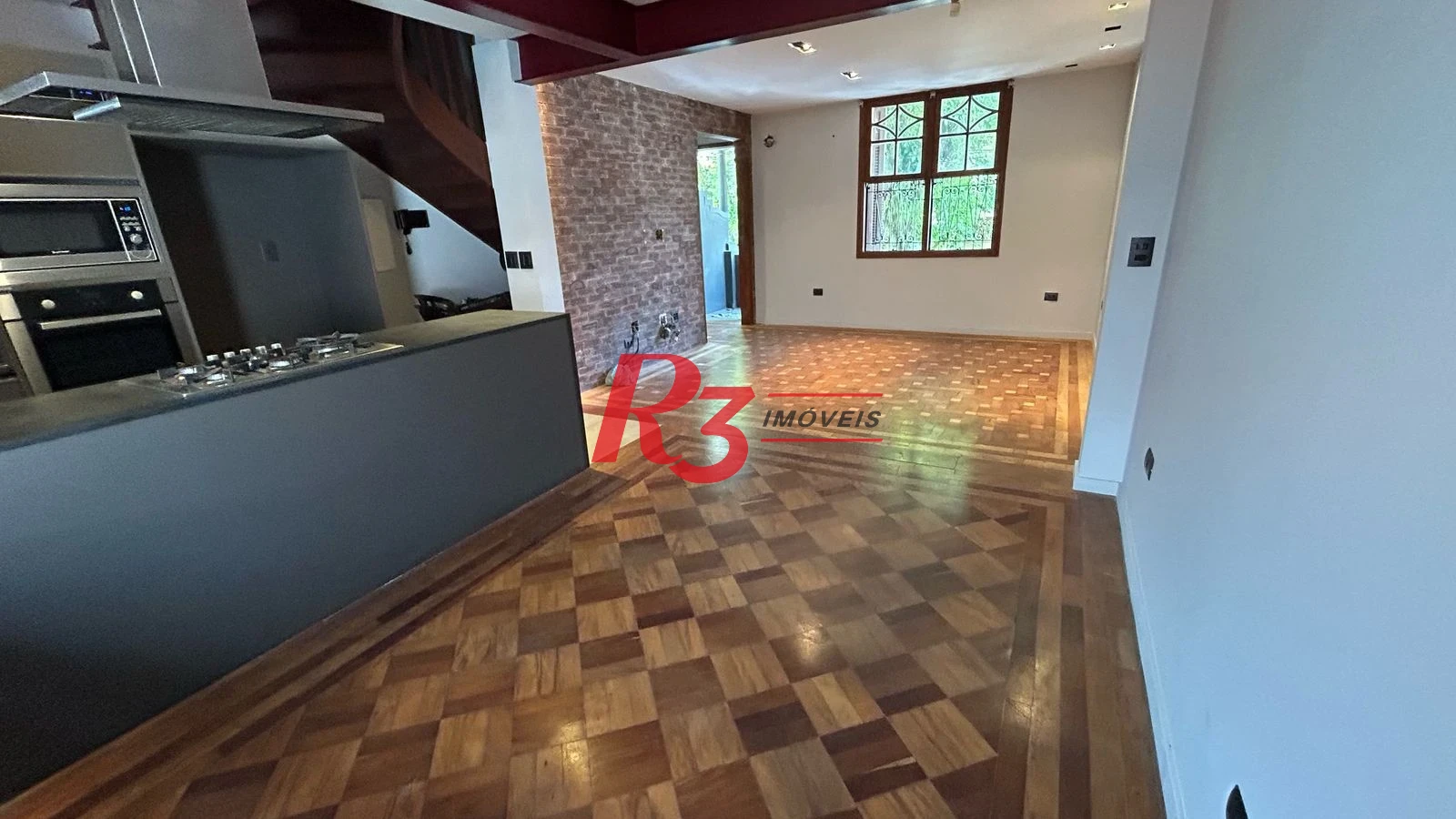Sobrado com 3 dormitórios à venda, 96 m² por R$ 780.000,00 - Gonzaga - Santos/SP