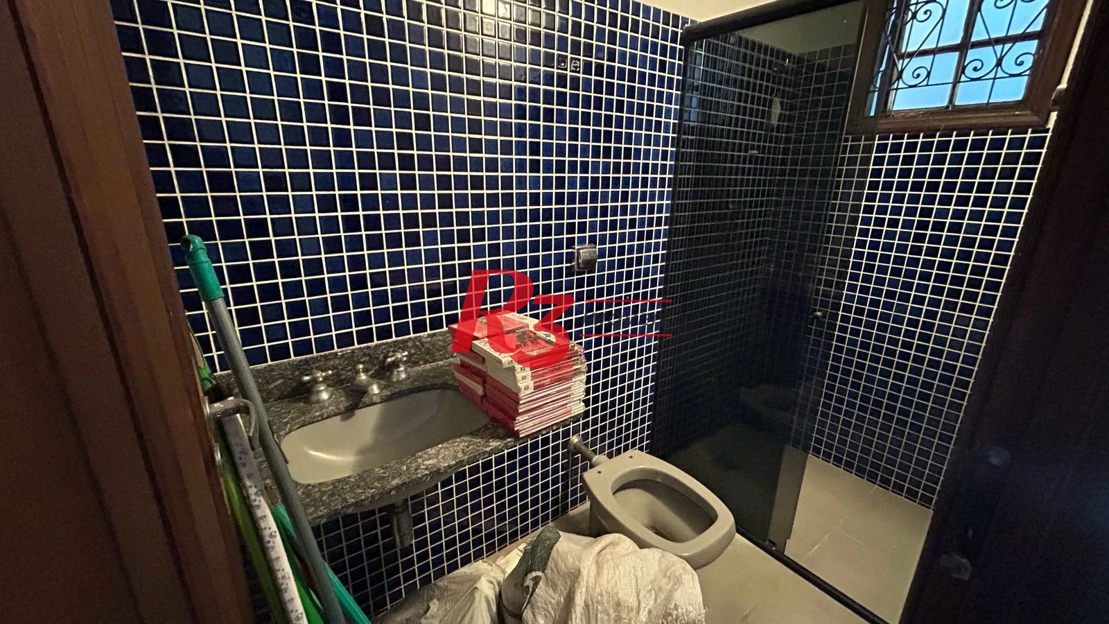 Sobrado com 3 dormitórios à venda, 96 m² por R$ 780.000,00 - Gonzaga - Santos/SP
