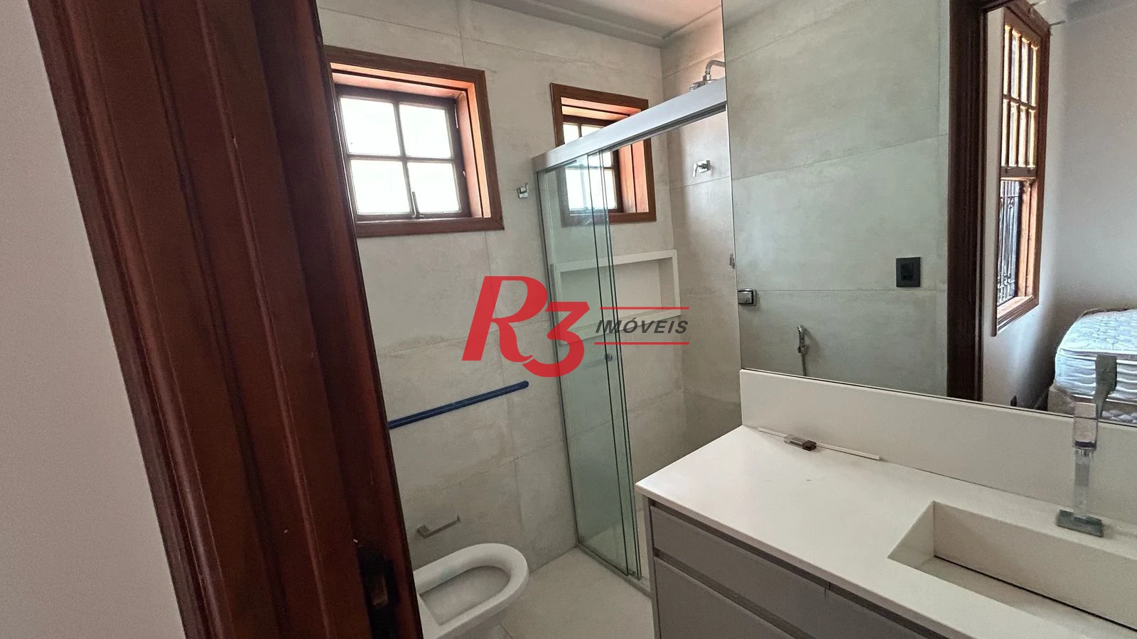 Sobrado com 3 dormitórios à venda, 96 m² por R$ 780.000,00 - Gonzaga - Santos/SP