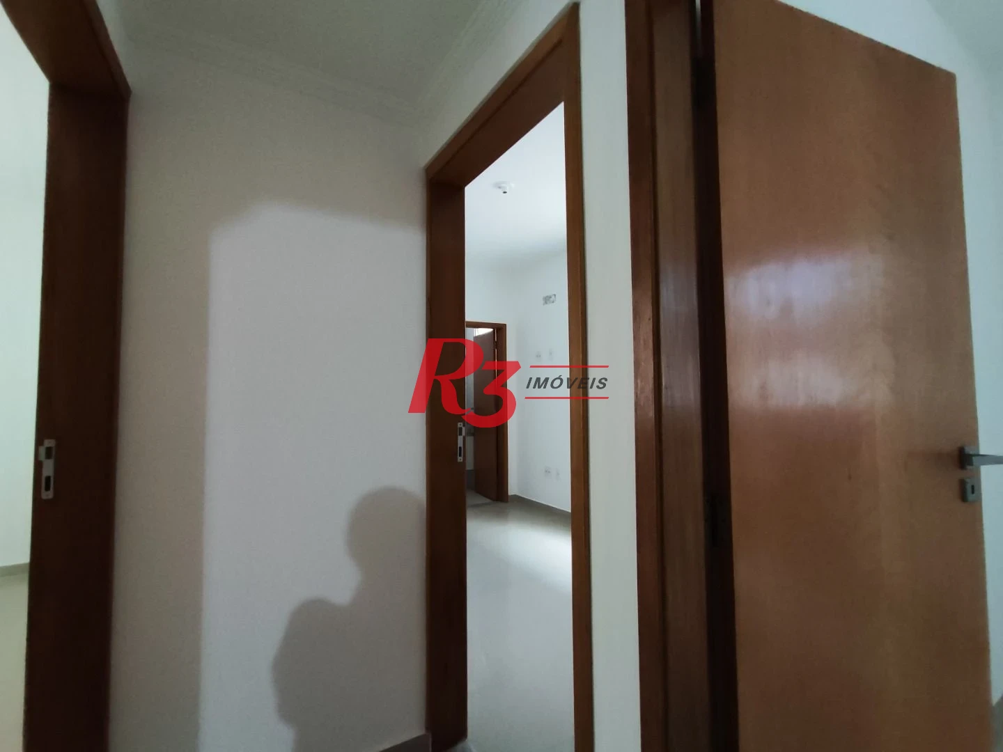 SOBREPOSTA TÉRREA ISOLADA QUINTAL  com 3 SUÍTES, 2 VAGAS à venda, 123 m² por R$ 950.000 - Ponta da Praia - Santos/SP