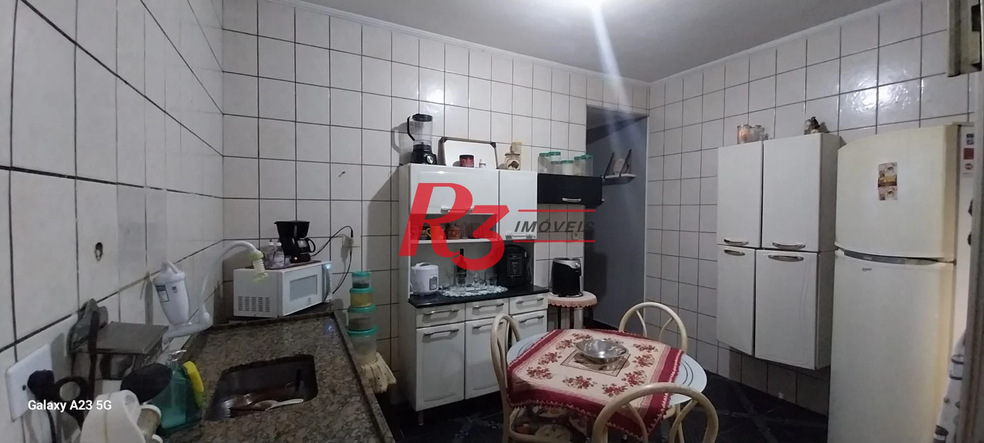 Sobrado com 3 dormitórios à venda, 100 m² por R$ 300.000,00 - Rádio Club - Santos/SP