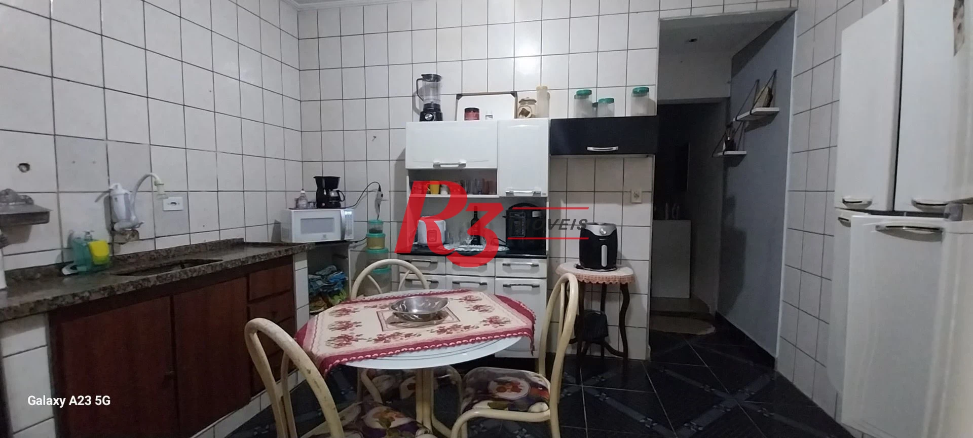 Sobrado com 3 dormitórios à venda, 100 m² por R$ 300.000,00 - Rádio Club - Santos/SP
