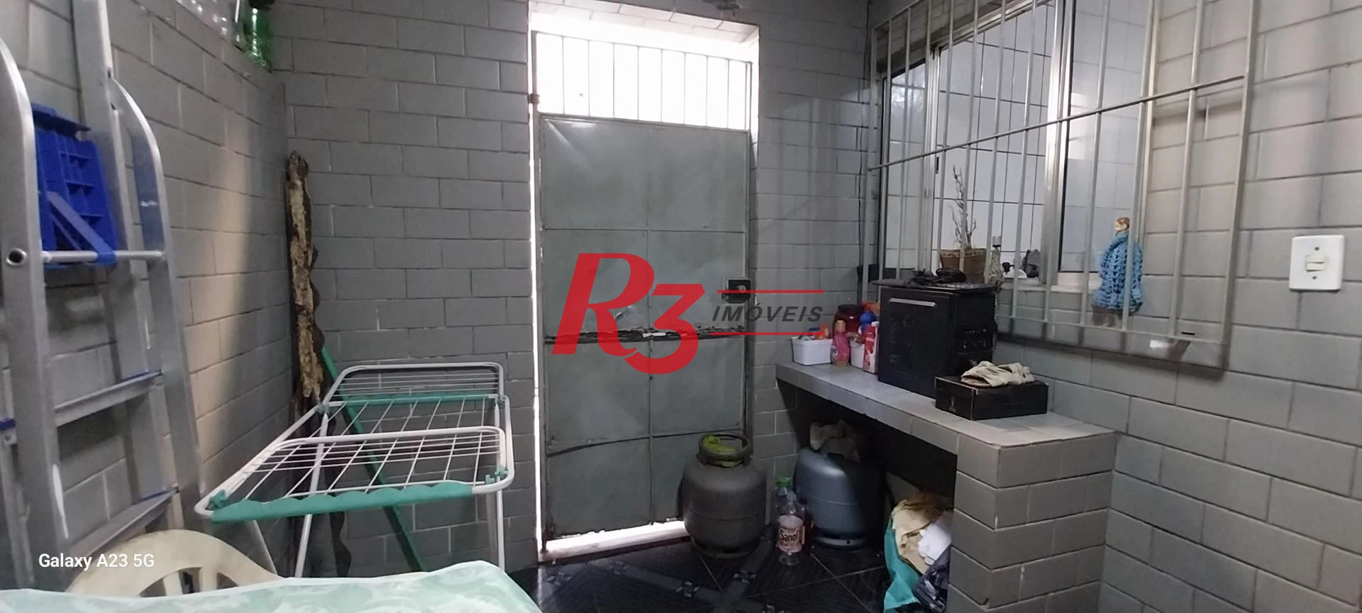 Sobrado com 3 dormitórios à venda, 100 m² por R$ 300.000,00 - Rádio Club - Santos/SP
