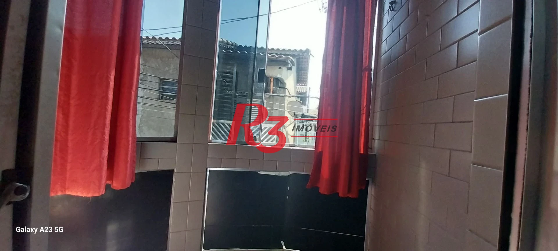 Sobrado com 3 dormitórios à venda, 100 m² por R$ 300.000,00 - Rádio Club - Santos/SP