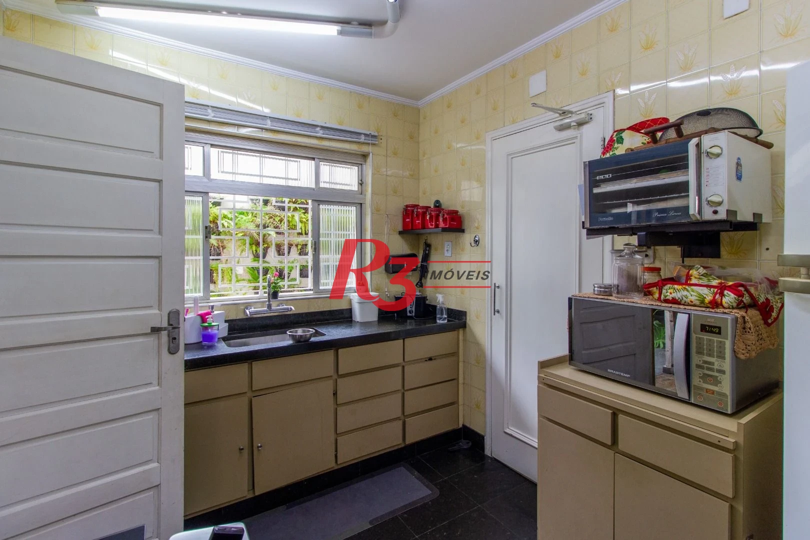 Sobrado para alugar, 320 m² por R$ 16.902,00/mês - Gonzaga - Santos/SP