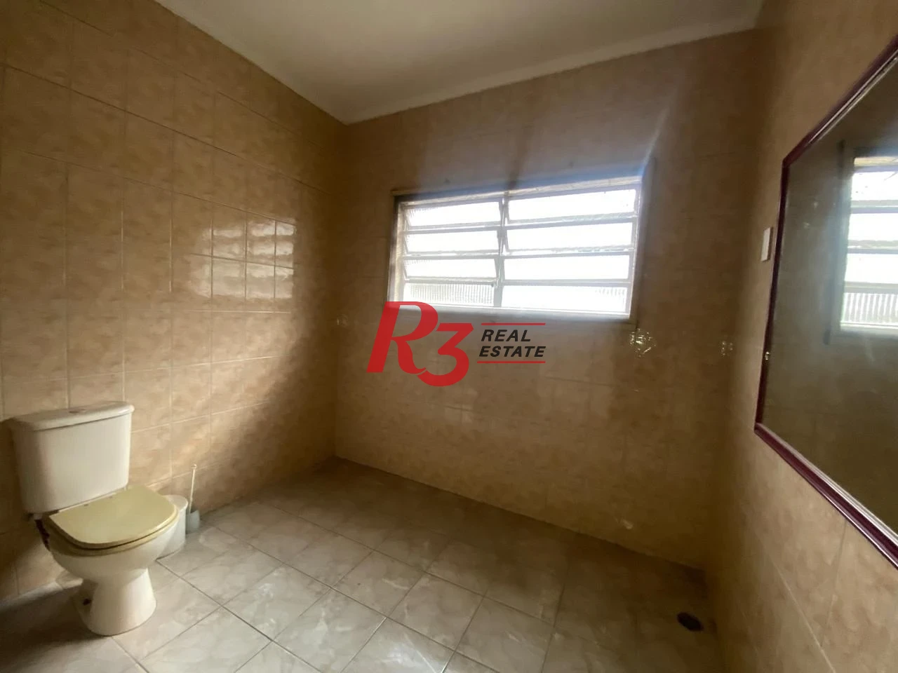 Sobrado para alugar, 219 m² por R$ 8.000,00/mês - Vila Matias - Santos/SP