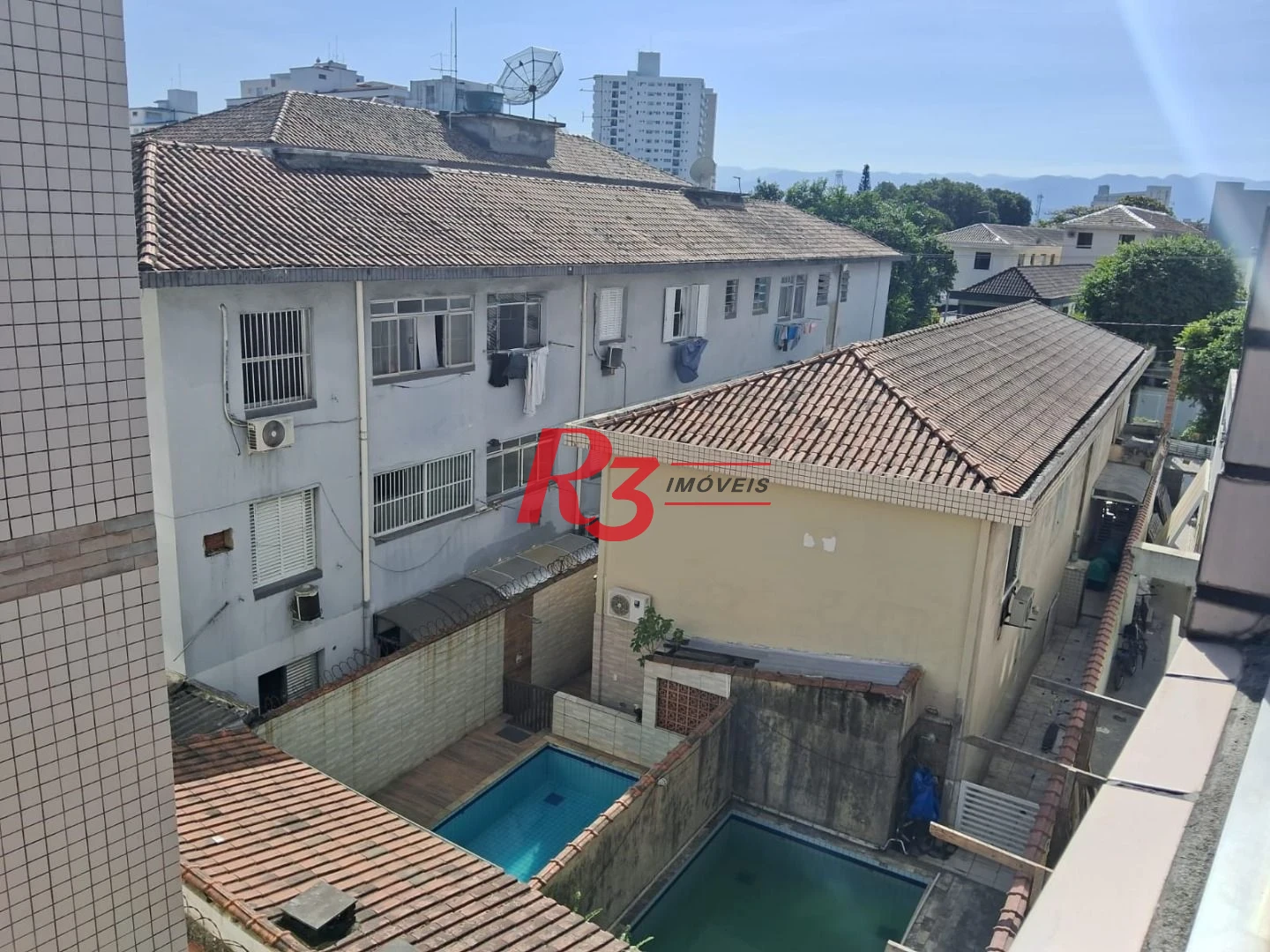 Apartamento com 2 dormitórios à venda, 82 m² por R$ 450.000,00 - Embaré - Santos/SP
