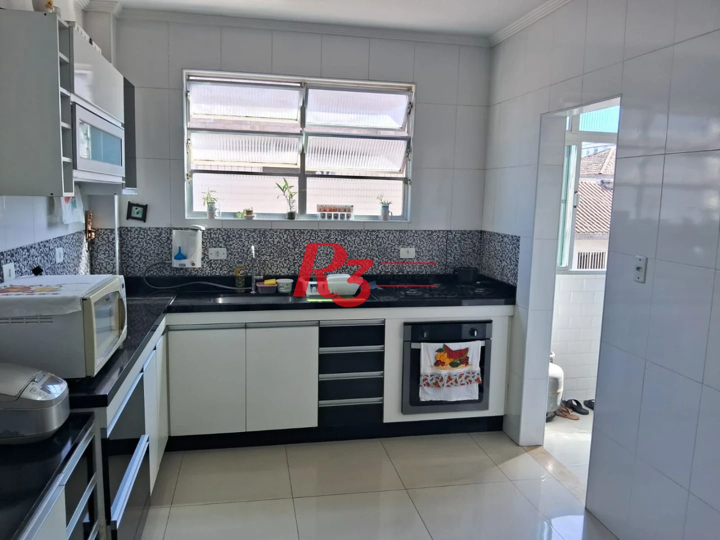Apartamento com 2 dormitórios à venda, 82 m² por R$ 450.000,00 - Embaré - Santos/SP
