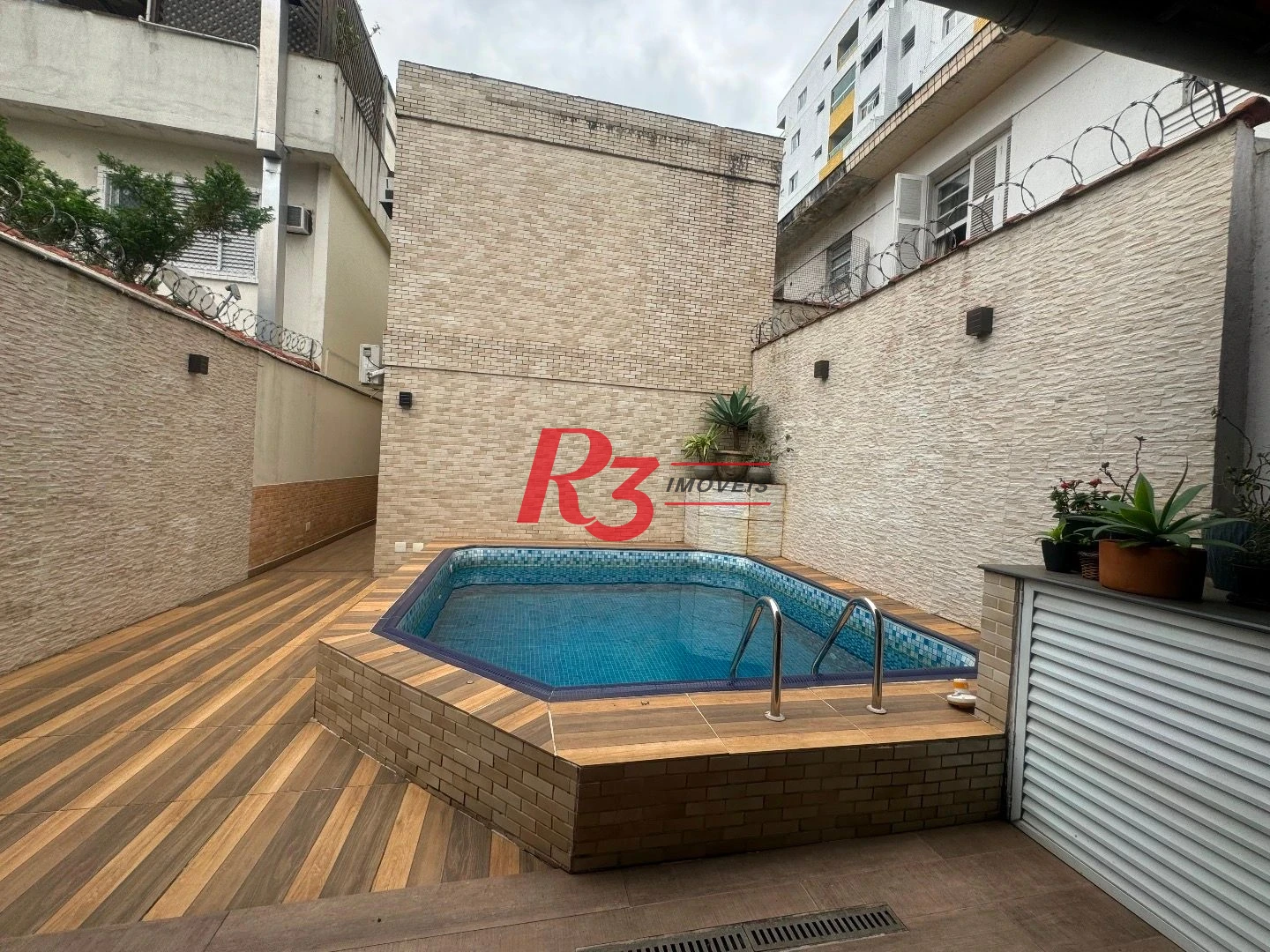 Casa com 4 dormitórios à venda, 170 m² por R$ 1.395.000,00 - Campo Grande - Santos/SP