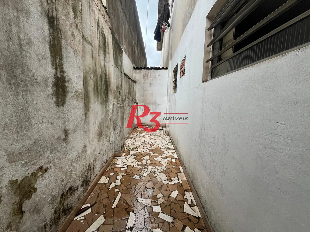 Sobrado à venda, 115 m² por R$ 600.000,00 - Ponta da Praia - Santos/SP