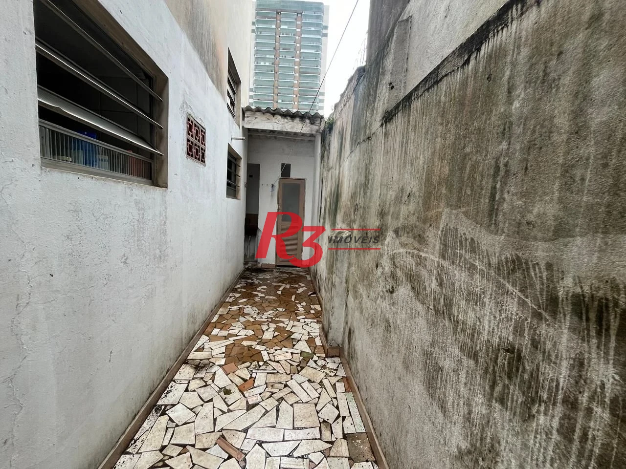 Sobrado à venda, 115 m² por R$ 600.000,00 - Ponta da Praia - Santos/SP