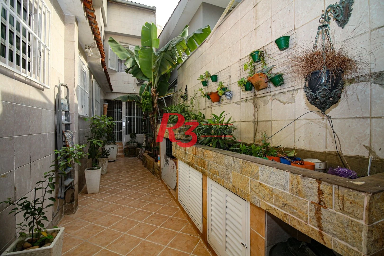 Casa à venda, 350 m² por R$ 1.580.000,00 - Vila Belmiro - Santos/SP