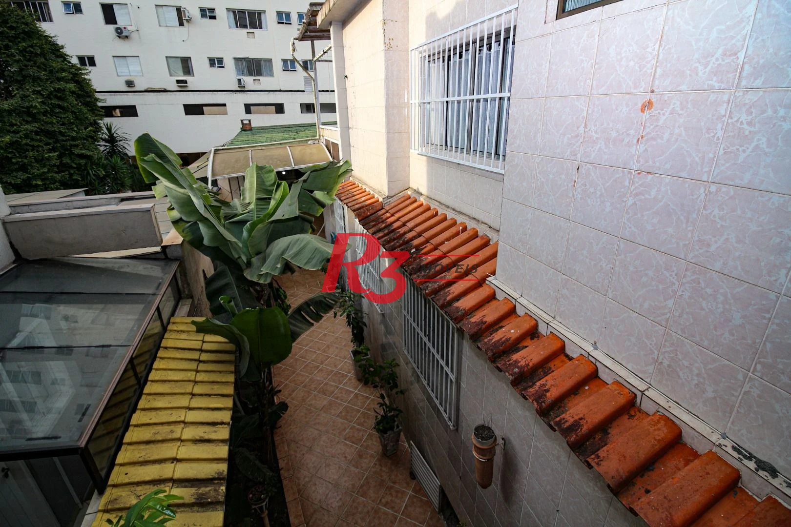 Casa à venda, 350 m² por R$ 1.580.000,00 - Vila Belmiro - Santos/SP