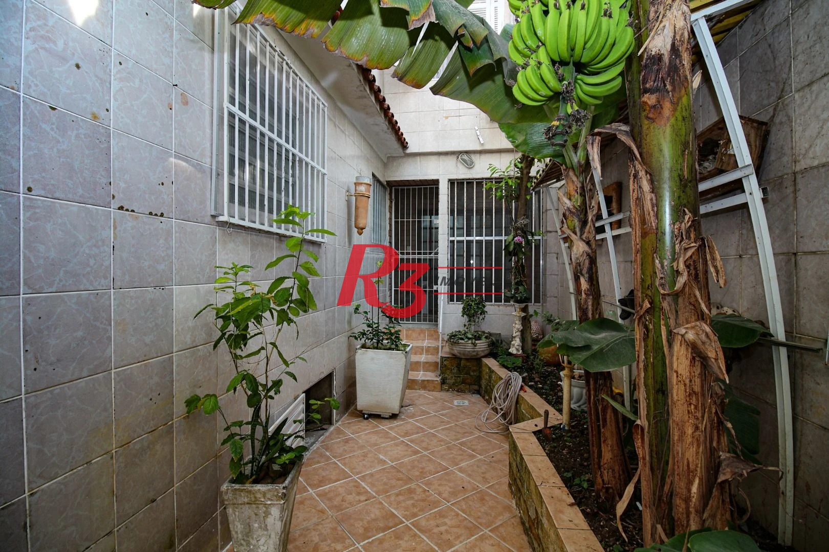 Casa à venda, 350 m² por R$ 1.580.000,00 - Vila Belmiro - Santos/SP