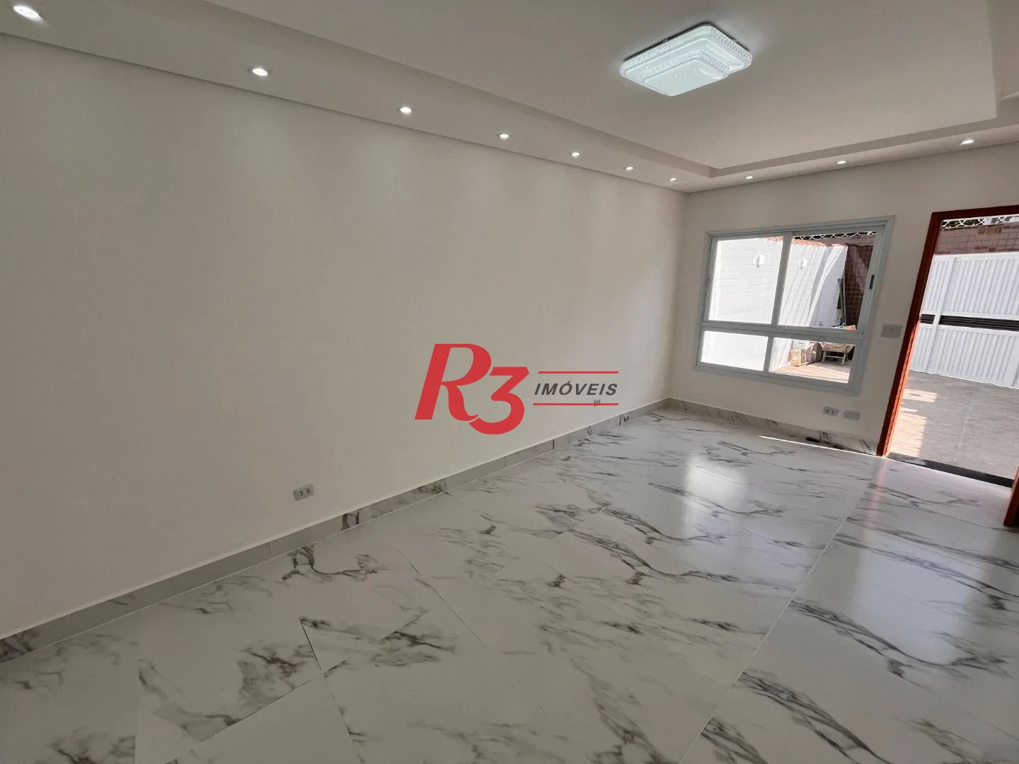 Casa com 3 dormitórios à venda, 115 m² por R$ 1.290.000,00 - Embaré - Santos/SP