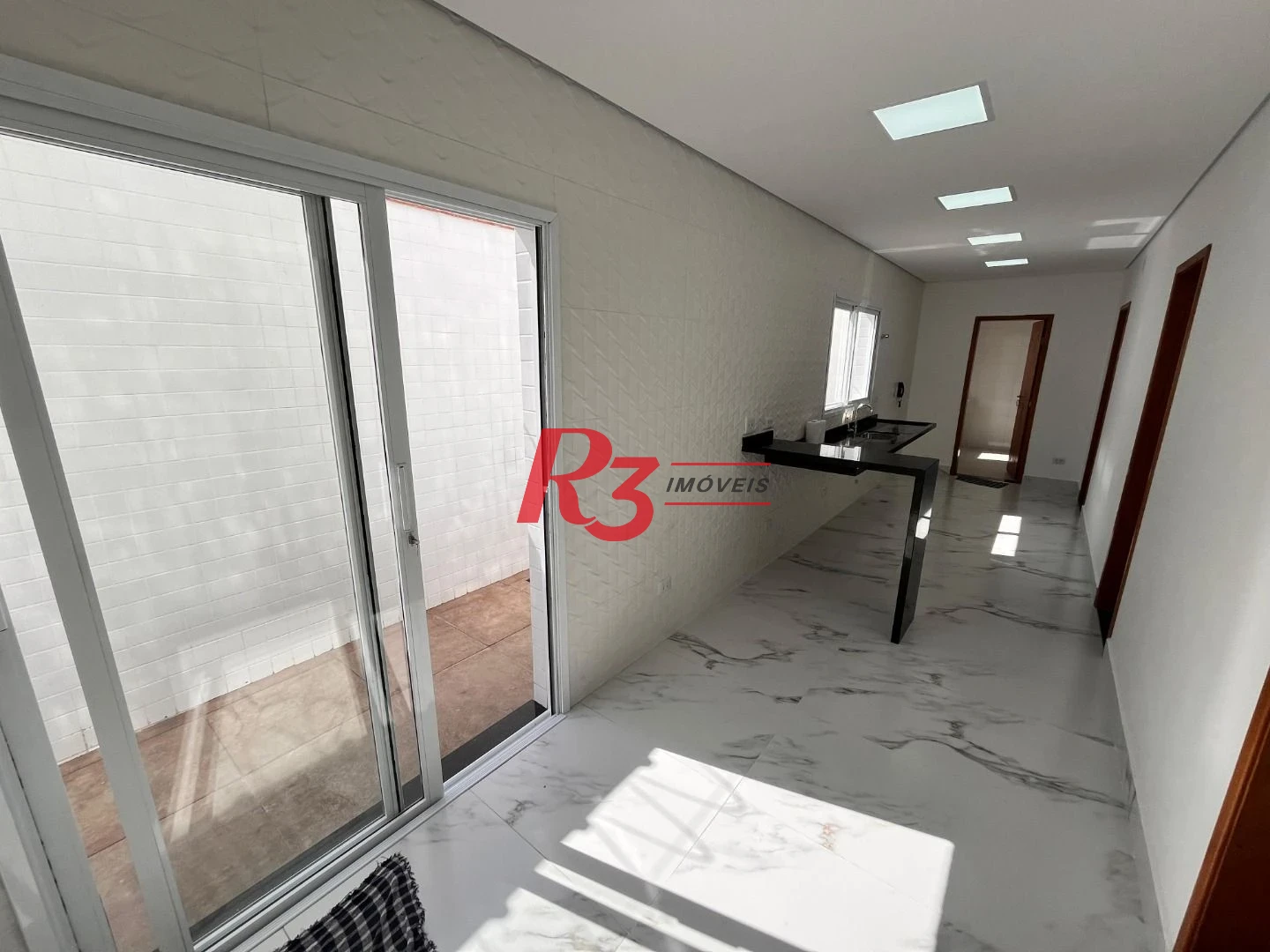 Casa com 3 dormitórios à venda, 115 m² por R$ 1.290.000,00 - Embaré - Santos/SP