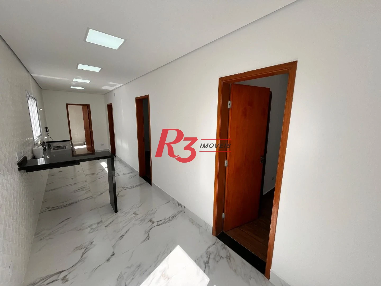 Casa com 3 dormitórios à venda, 115 m² por R$ 1.290.000,00 - Embaré - Santos/SP