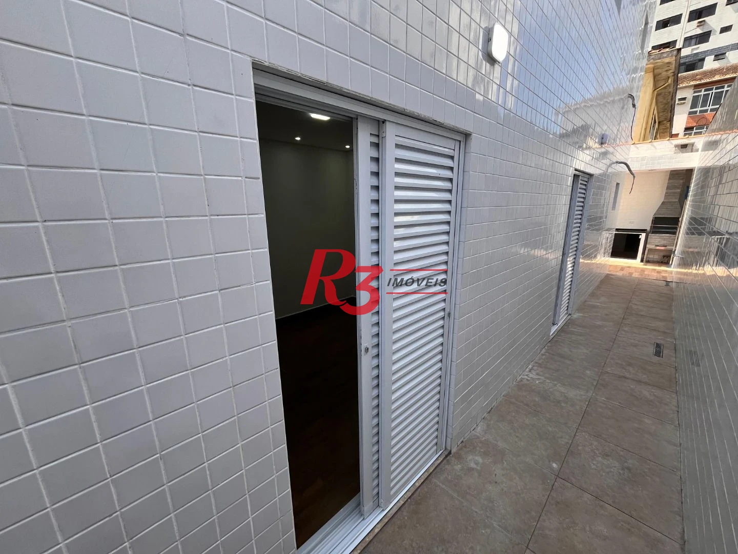 Casa com 3 dormitórios à venda, 115 m² por R$ 1.290.000,00 - Embaré - Santos/SP