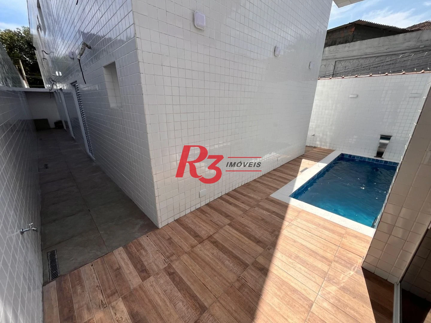 Casa com 3 dormitórios à venda, 115 m² por R$ 1.290.000,00 - Embaré - Santos/SP