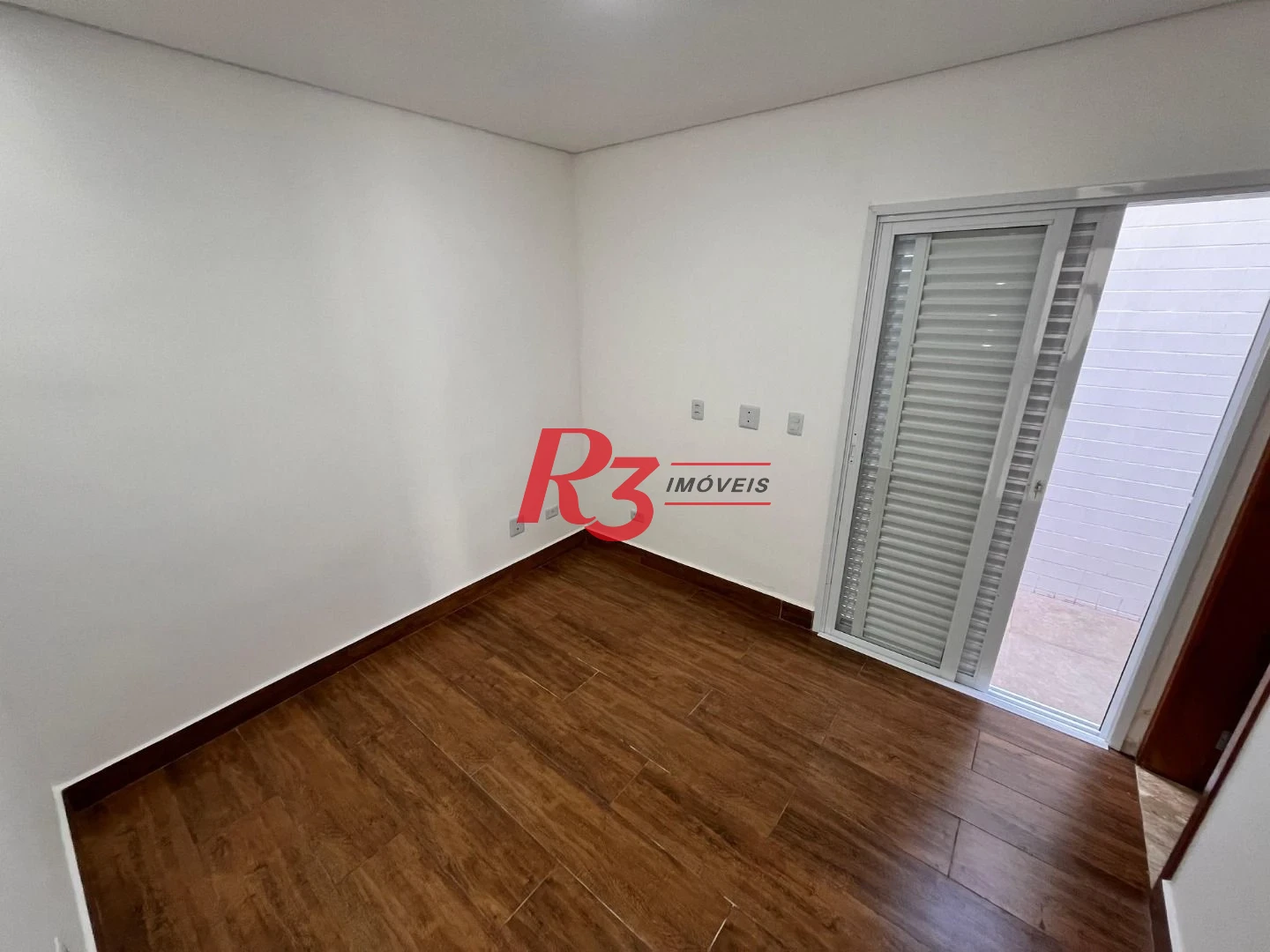 Casa com 3 dormitórios à venda, 115 m² por R$ 1.290.000,00 - Embaré - Santos/SP
