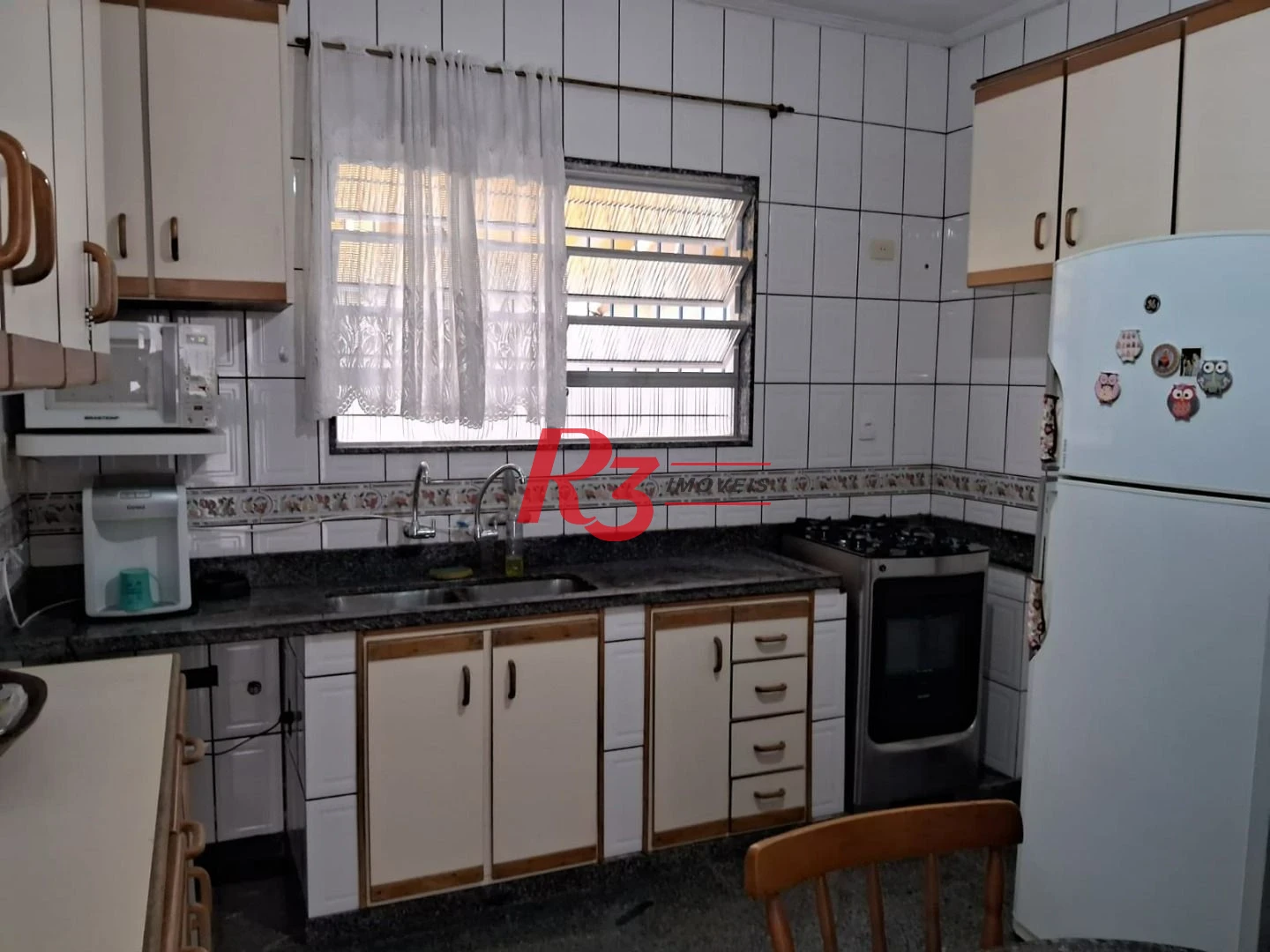 Sobrado com 3 dormitórios à venda, 120 m² por R$ 480.000,00 - Chico de Paula - Santos/SP