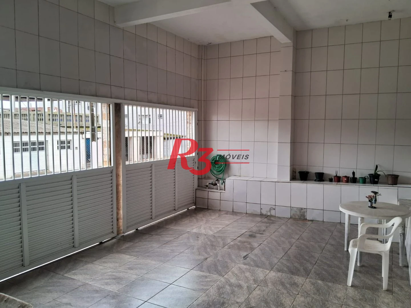 Sobrado com 3 dormitórios à venda, 120 m² por R$ 480.000,00 - Chico de Paula - Santos/SP