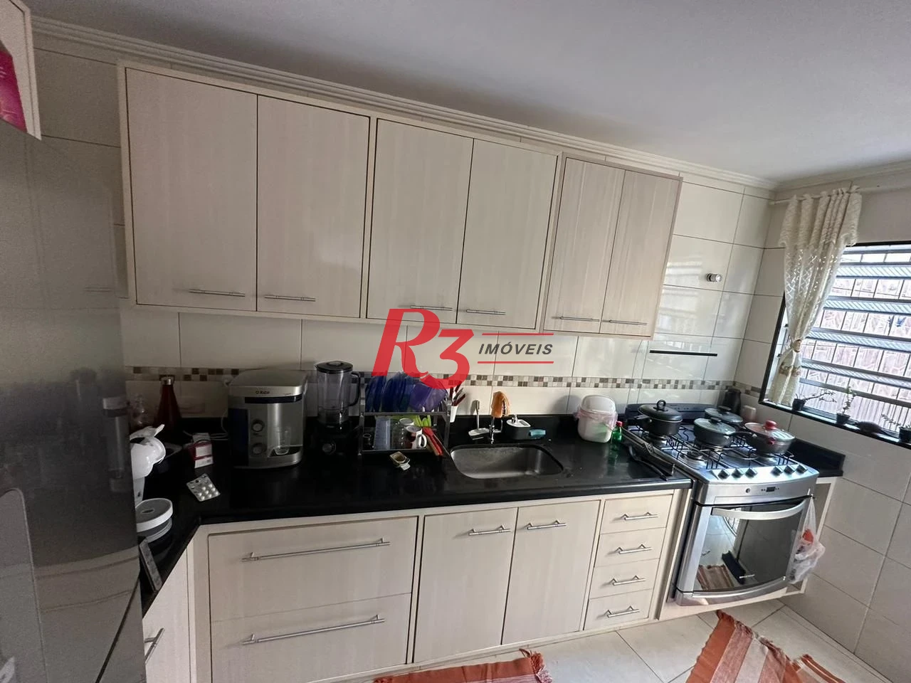 Casa com 3 dormitórios à venda, 109 m² por R$ 352.000,00 - Parque Bitaru - São Vicente/SP