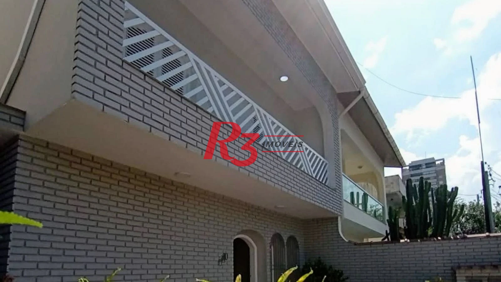 Sobrado com 4 dormitórios à venda, 214 m² por R$ 1.385.000,00 - Embaré - Santos/SP