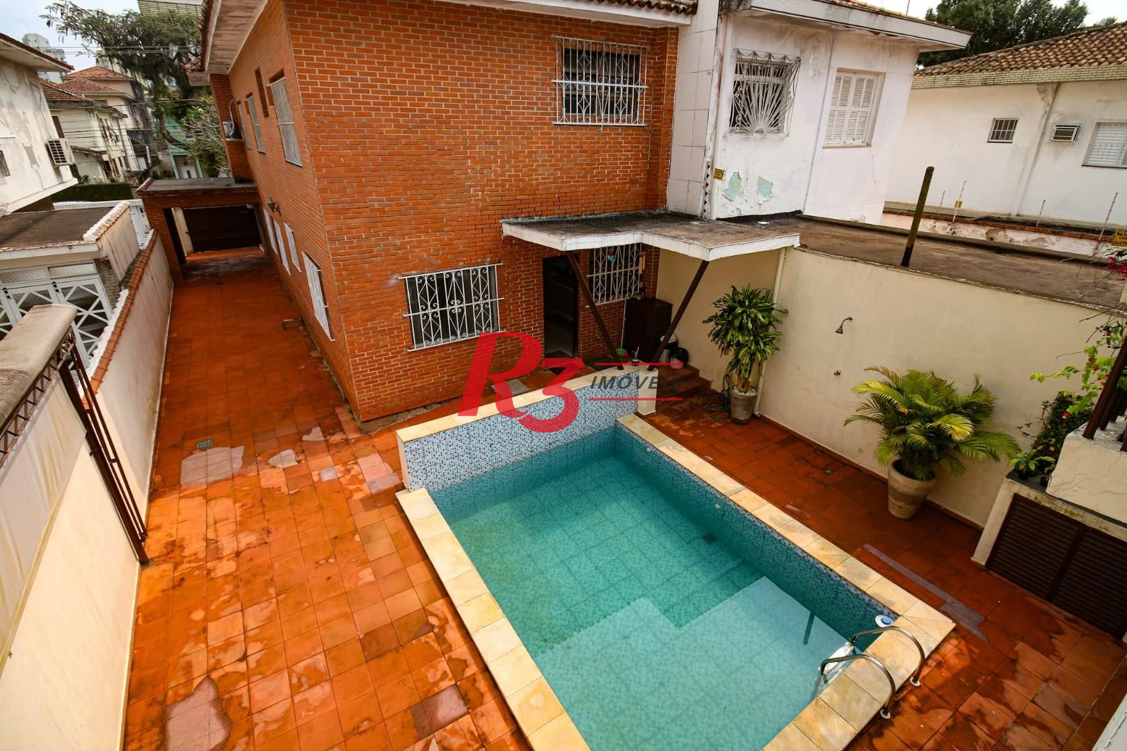 Sobrado com 4 dormitórios, 325 m² - venda por R$ 2.500.000,00 ou aluguel por R$ 8.000,00/mês - Embaré - Santos/SP