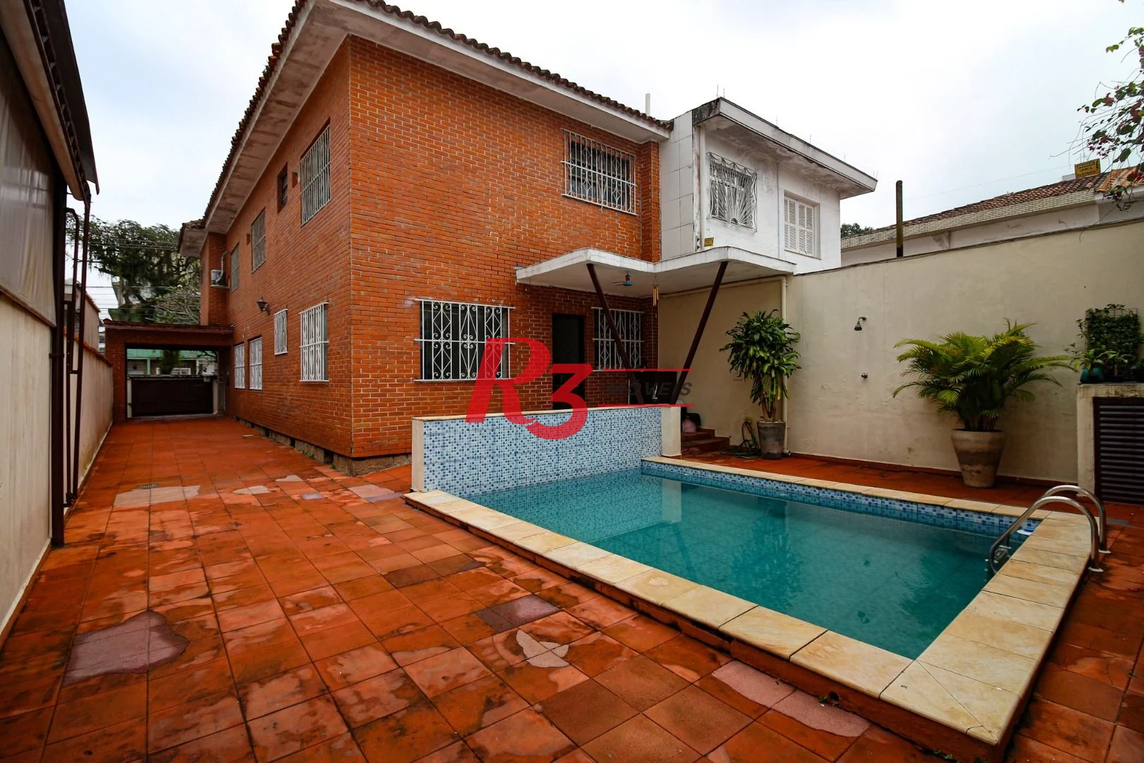 Sobrado com 4 dormitórios, 325 m² - venda por R$ 2.500.000,00 ou aluguel por R$ 8.000,00/mês - Embaré - Santos/SP