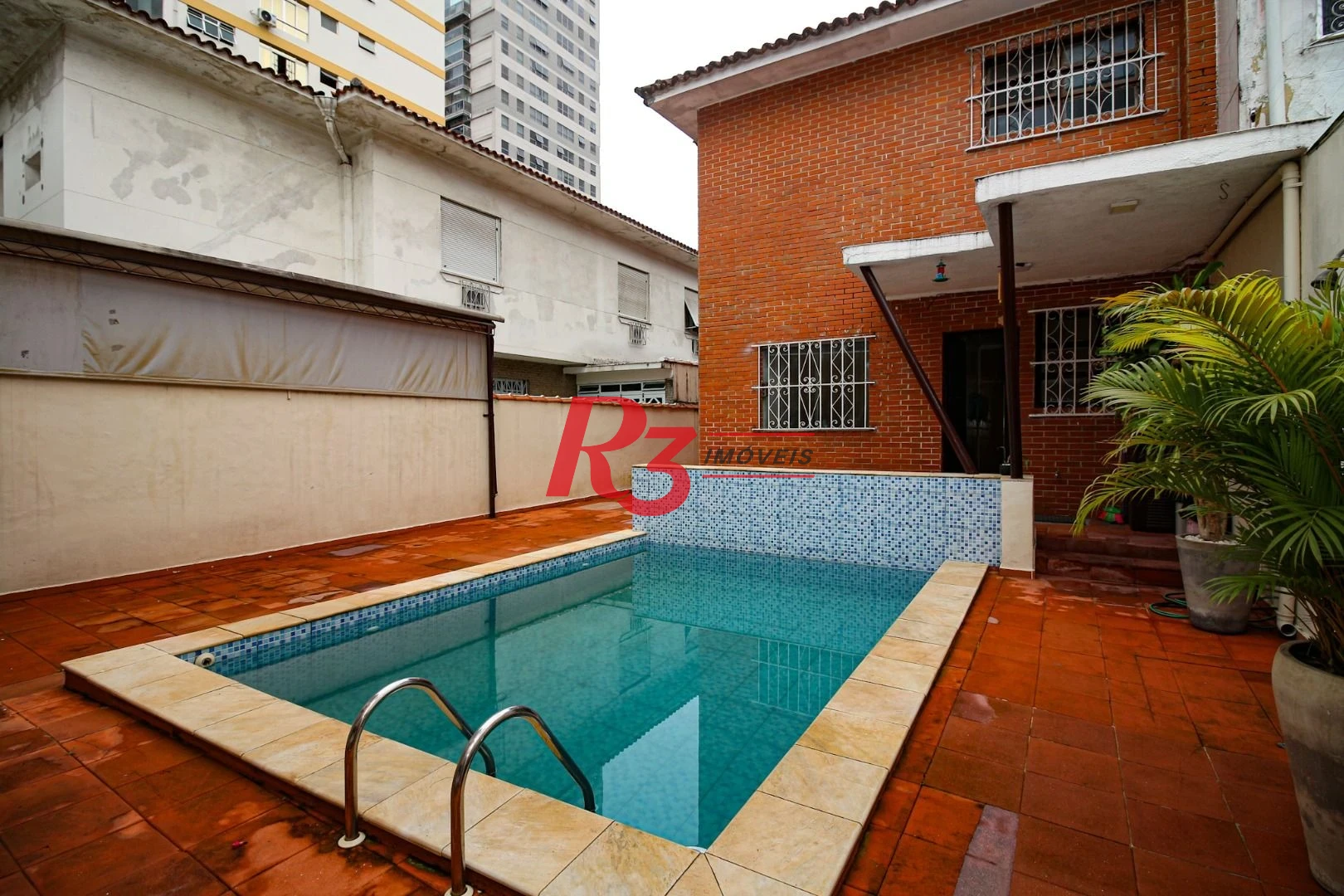 Sobrado com 4 dormitórios, 325 m² - venda por R$ 2.500.000,00 ou aluguel por R$ 8.000,00/mês - Embaré - Santos/SP