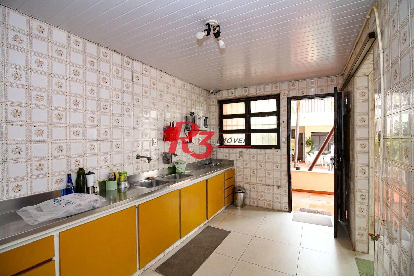 Sobrado com 4 dormitórios, 325 m² - venda por R$ 2.500.000,00 ou aluguel por R$ 8.000,00/mês - Embaré - Santos/SP
