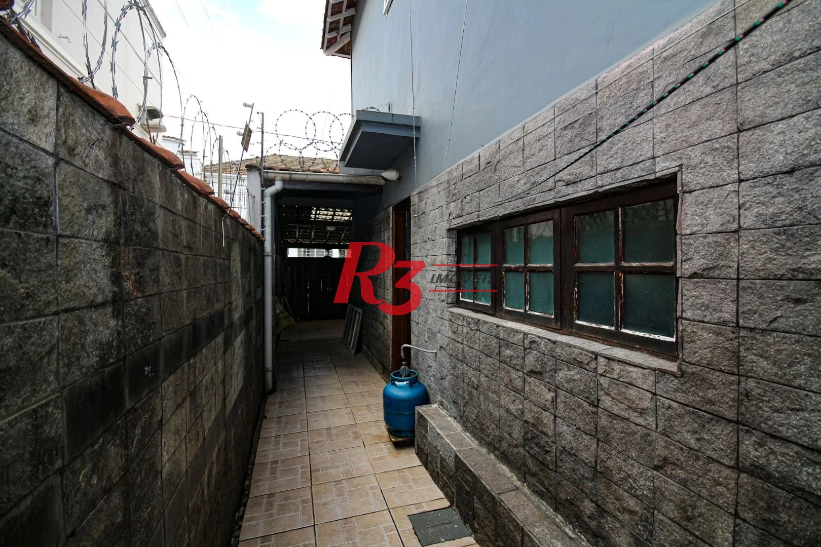 Sobrado à venda, 135 m² por R$ 1.015.000,00 - Boqueirão - Santos/SP